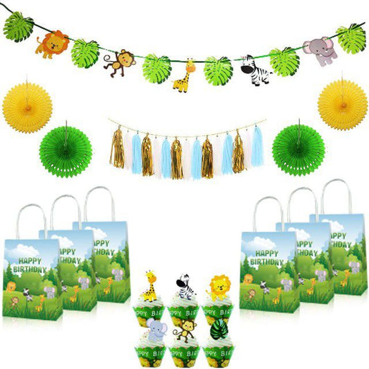 contents of i am one wild animals paper fans green and yellow tassels birthday packs and cupcake holders